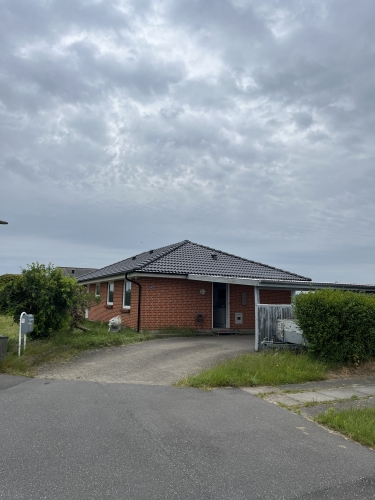 rødt hus med nyt tag